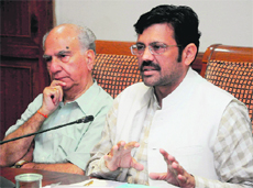 Punjab BJP chief Kamal Sharma (R) and state affairs in charge Shanta Kumar in Chandigarh on Sunday.