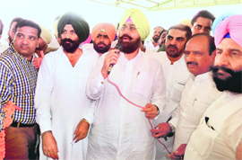 PPCC chief Partap Singh Bajwa addresses a gathering at Dera Bhajangarh near Guruharsahai in Ferozepur on Sunday.