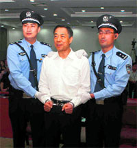 Bo Xilai (C) at a courtroom in Jinan, China, on Sunday. 