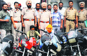 The two vehicle lifters arrested by the Civil Lines police with six stolen motorcycles in Amritsar. 