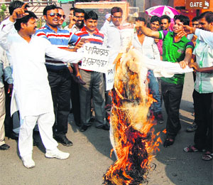 Members of the All-India Christian Dharam Yudh Morcha burn an effigy of Pakistan during a protest at Hall Gate in Amritsar on Monday.