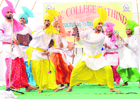 Fine footwork: Students of DAV College perform Malwai gidha during a talent hunt cultural programme in Bathinda on Monday. Tribune photo: Pawan Sharma (See also P2)