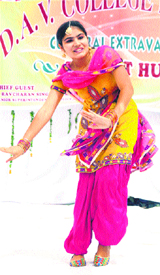 A student performs gidha at the talent hunt programme. 