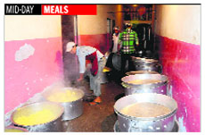 Mid-day meal being cooked in a dingy room at the GMSSS, Sector 47, Chandigarh.