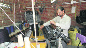 A hosiery owner runs his small unit at home. He will be able to improve his manufacturing quality and quantity in the cluster being developed at Darbi in Sirsa. 