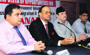 Speakers Col Sandhu and WWICS Group vice-president Deepak Kochhar address mediapersons in Karnal. 