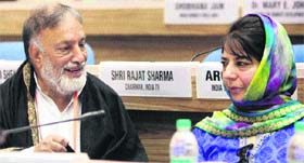 PDP president Mehbooba Mufti and National Panthers Party chief Bhim Singh at the National Integration Council in New Delhi on Monday.
