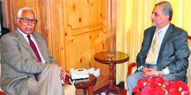 Jammu and Kashmir Bank Chairman Mushtaq Ahmad during a meeting with Governor NN Vohra at the Raj Bhawan in Srinagar on Monday.