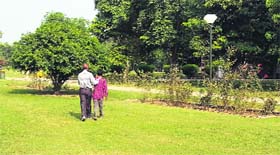 A boy being taken to the Rose Garden police post in Ludhiana.
