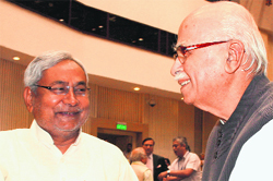 BJP leader LK Advani with Bihar CM Nitish Kumar in New Delhi on Monday. Tribune photo: Mukesh Aggarwal