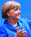 German Chancellor Angela Merkel, chairwoman of the Christian Democratic Union, points towards supporters at the party headquarters in Berlin.  AP/PTI