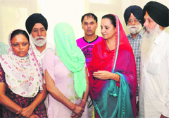 The acid attack victim (face covered) in Chandigarh on Tuesday. Tribune photo: Manoj Mahajan