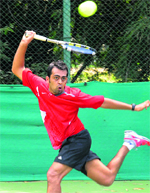 A player returns as shot during the ongoing AITA-CLTA Tennis Championshipin Chandigarh on Tuesday. Tribune Photo: Manoj Mahajan 