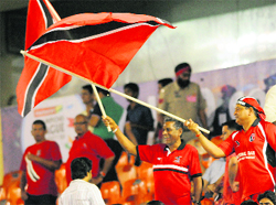 Fans enjoy a match of the CLT20 Championship at the PCA Stadium in Mohali on Tuesday. Tribune photo: Vicky Gharu 