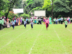 Students take part in a race at a sports event organised by the Sardar Bhagwan Singh Institute of Bio-Medical Sciences in Dehradun on Tuesday. 