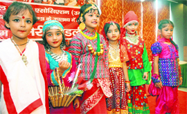 Children ready to perform at a function held to celebrate Girls Day in Dehradun on Tuesday. 