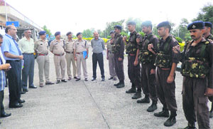 HP police commandos led by Chandan Katoch and other police officers and AAI officials at the Kangra airport on Tuesday. 