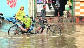 A waterlogged street in Sofaian Bagh.
