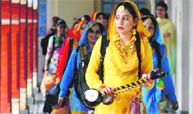 Girls on their way to perform a giddha during the Panjab University Zonal Youth and Heritage Festival at the Khalsa College for Women in Ludhiana.