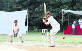 A player in action during the HNB Garhwal University Inter-Collegiate Twenty20 Cricket Tournament in Dehradun on Wednesday