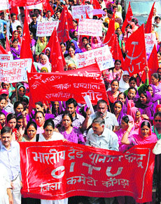Members of different trade unions raise anti-government slogans during a demonstration at Dharamsala on Wednesday. 