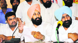 Members of the Panchayat Union of Punjab address the mediapersons in Jalandhar  on Wednesday. A Tribune Photograph 