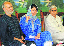 Peoples Democratic Party president Mehbooba Mufti addresses a press conference in Srinagar on Wednesday. 