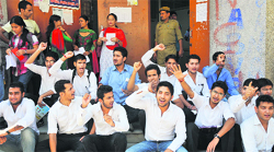 Members of the Akhil Bharatiya Vidyarthi Parishad and students of Jammu University protest on Wednesday. Tribune photo: Inderjeet Singh