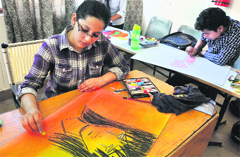 Students participate in a painting competition at the Jammu University on Wednesday. Tribune Photo: Inderjeet Singh