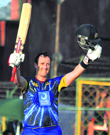 Otago Volts batsman Neil Broom celebrates his century against Perth Scorchers in Jaipur on Wednesday.  PTI