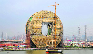 The under-construction 33-storey Copper Coin Building on the banks of the Zhujiang in Guangzhou city, China, on Tuesday. 