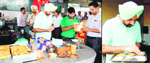 District Health Officer Dr Shivkaran Singh Kahlon and his team collect food samples during raids on a canteen; and (right) boys hostel at Guru Nanak Dev University in Amritsar on Thursday. 
