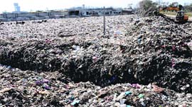 A view of the garbage dumping site on the Mansa road.