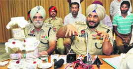 SSP Ravcharan Brar addresses mediapersons in Bathinda on Thursday.