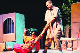 Artistes enact a scene from the play Baldey Tibbey at the Tagore Theatre in Chandigarh on Thursday.
