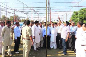Deputy Commissioner J Ganesan and SSP Saurabh Singh review the preparations of the stage for the Chief Minister's rally at Kharia in Sirsa