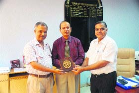 Vice-Chancellor Major Gen Shrikant (retd) flanked by Dr Ravindra Sharma and Dr Naresh Kakker