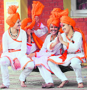 Girls with saffron turbans (the colour that signifies bravery) at the concluding occasion of the Panjab University Zonal Youth and Heritage Festival (zone B) in Ludhiana on Thursday.