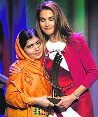 Malala Yousafzai (L) in New York on Wednesday.