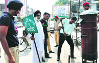 A signboard for a PCR point being erected in Bathinda. Tribune photo: Pawan Sharma