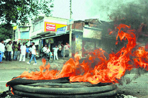 People blocked the Jammu-Pathankot highway on Friday in protest against militant attacks in Kathua and Samba districts of Jammu. 