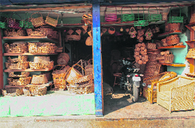  A bike is parked inside a wicker shop in Srinagar. 