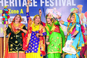 Girls perform giddha during the Panjab University zonal youth fest at Guru Nanak National College in Doraha on Friday. 