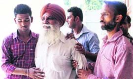 Inconsolable family members of Balwinder Kaur in Amritsar on Saturday.