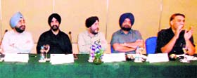 Amritsar Hotel and Restaurant Association members at a meeting with Municipal Corporation Commissioner DPS Kharbanda and police officials in Amritsar on Saturday.