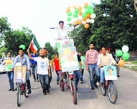 Youths celebrate the birthday anniversary of Shaheed Bhagat Singh in Chandigarh on Saturday