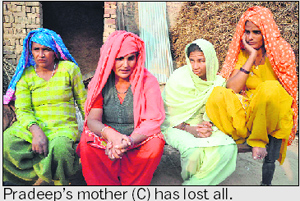 Pradeeps mother (C) has lost all.