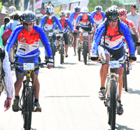 Cyclists participate in Discovery Montra MTB-2013 in Shimla on Saturday. Photo Amit Kanwar