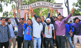 Students of MAM College protest against the twin terror attacks in Hiranagar and Samba in Jammu on Saturday.