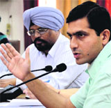 DC Rajat Aggarwal addresses officials in Ludhiana on Saturday. 